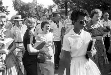 September 4, 1957, Elizabeth Eckford – one of nine black students attempting to attend Central High School, in Little Rock, Arkansas – is met with jeers and turned back by National Guard troops. 