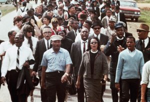 Dr. Martin Luther King and Coretta Scott King lead the Selma to Montgomery March, 1965.