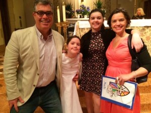 Michael Murphy (L) with his wife and two daughters